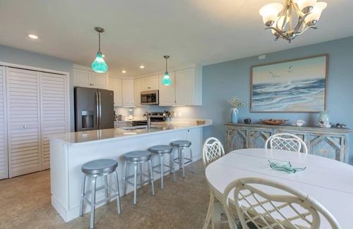 New Smyrna Beach Condo | Oceanfront Ground-Floor Retreat on No-Drive Beach | Peace & Comfort