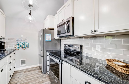 South Beach House | Oceanfront home with hot tub, private beach access & ocean views - dog-friendly