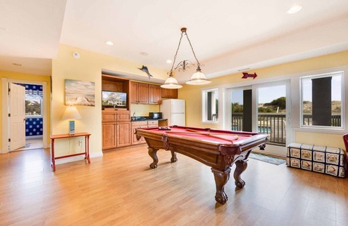 Ocean Isle Estates House | Oceanfront Home with Hot Tub, Pool, Putting Green, Elevator, and Game Room