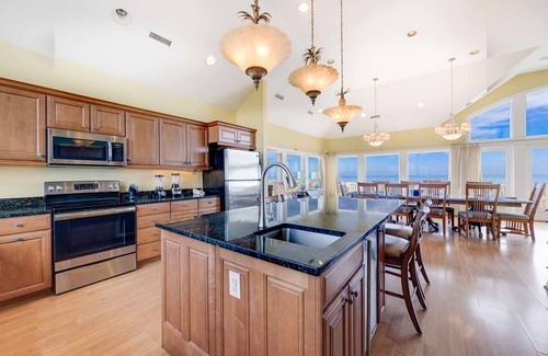 Ocean Isle Estates House | Oceanfront Home with Hot Tub, Pool, Putting Green, Elevator, and Game Room