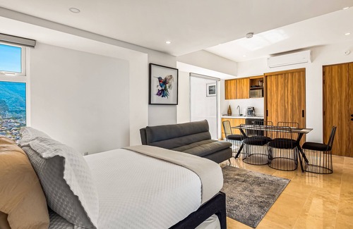 Las Glorias Apartment | Oceanfront studio with private balcony, rooftop infinity pool & gym
