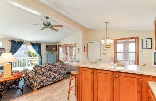 Ocean Isle Estates House | Oceanside cottage just a short walk to the beach with a community pool!