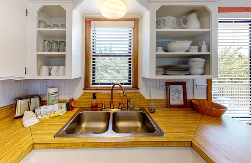 Avon House | Oceanside home with pool access, rooftop deck, screened porch - walk to beach