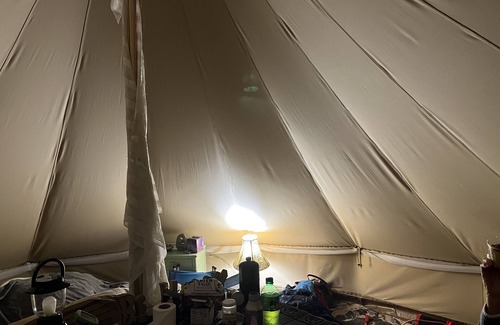 Bryson City RV Rental | Off grid Bell Tent Full size Bed & Solar powered.