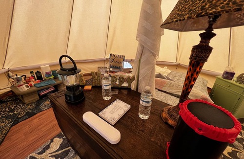 Bryson City RV Rental | Off grid Bell Tent Full size Bed & Solar powered.