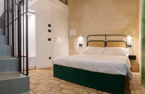 Fermo Bed & Breakfast | OGNISSANTI GUESTHOUSE,MARCHE REGION'S Double room with bathroom and a mezzanine with two single beds