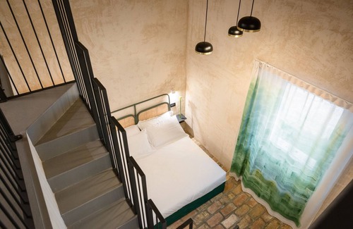 Fermo Bed & Breakfast | OGNISSANTI GUESTHOUSE,MARCHE REGION'S Double room with bathroom and a mezzanine with two single beds