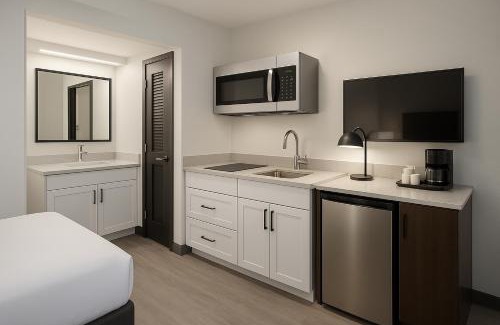 Wheatland Hotel | OKC Del Sol Casa Suites- Extended Stay