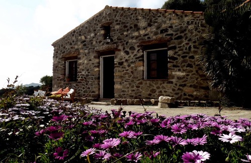 Sant'Antioco Cottage | Old and cozy typical stone house with terrace under the olive trees