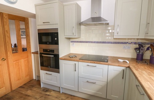 Cemaes Bay Cottage | OLD SCHOOL HOUSE, family friendly, with open fire in Cemaes Bay