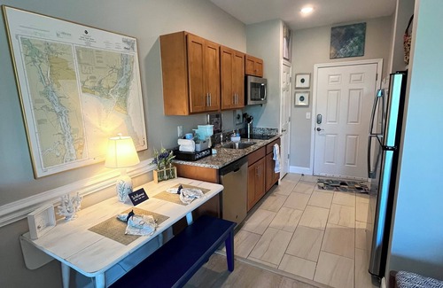 Southport Condo | On the picturesque SPT Waterfront! Beautiful Pool & Private Beach!