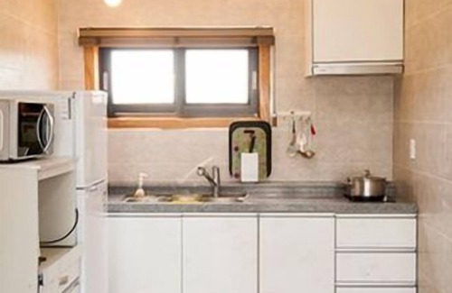 Seongsan Apartment | On The Stone Pension