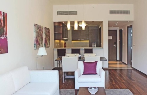 Al Muraqqabat House | One bedroom Apartment Near Gold Souk Metro Station By Luxury Bookings