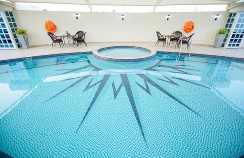 Al Muraqqabat House | One Bedroom Apartment Near Al Shamsi Building By Luxury Bookings