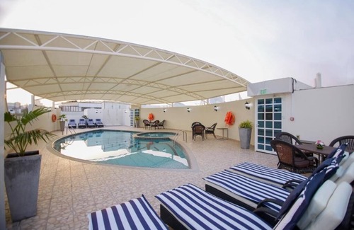 Al Muraqqabat House | One Bedroom Apartment Near Al Shamsi Building By Luxury Bookings
