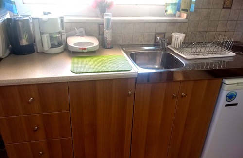 Kato Stalos Condo | One bedroom apartment with large garden, in quiet location, 10 min walk to beach