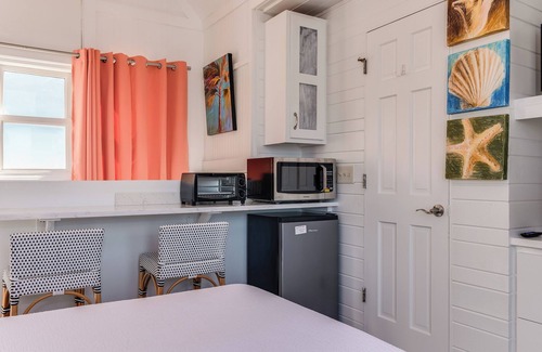 Bald Head Island House | One bedroom oasis with marina and marsh views! Heart of the island with one golf cart