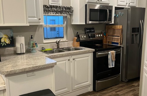 Miramar Beach Cottage | One block from Pompano Joes is our resort cottage with large patio for relaxing