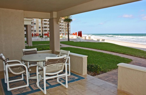 New Smyrna Beach Condo | One of a kind ground floor, three bedroom, three bath corner. Amazing south east ocean views.