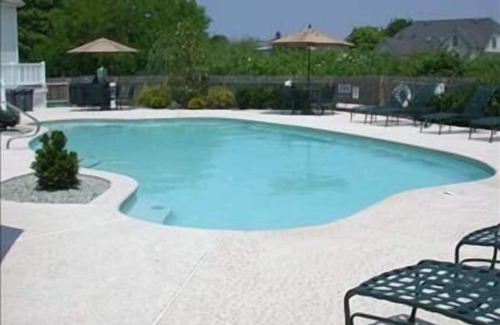 Cape May Condo | One of Cape May's finest rentals with pool located steps from favorite beaches and walking distance to shops and restaurants.