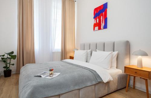 Friedrichshain Apartment | oompH Berlin 3BR Apt with Light Tones and Artwork