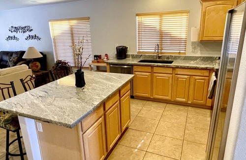 Canyon Ridge West House | Open Living Space in Family-friendly Neighborhood