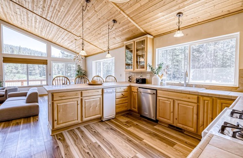 Soda Springs House | Outdoorsy waterfront home with skiing, full kitchen, foosball, & W/D
