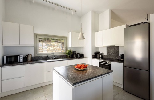 Paros Villa | OUTSTANDING NEW VILLA WITH A GREAT POOL AREA AND BREATHTAKING SEA VIEW