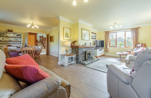 Wadebridge House | Overlooking the lakes of Roserrow, April Cottage is in an enviable location.
