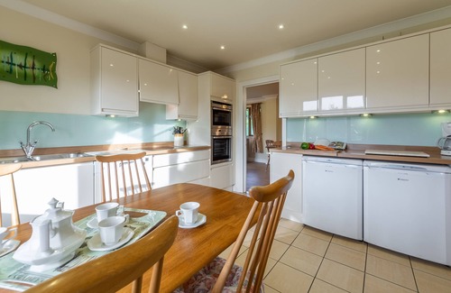 Wadebridge House | Overlooking the lakes of Roserrow, April Cottage is in an enviable location.