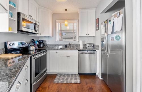 Colington Condo | Oyster Pointe E3: Soundfront | Shared Pool, Tennis