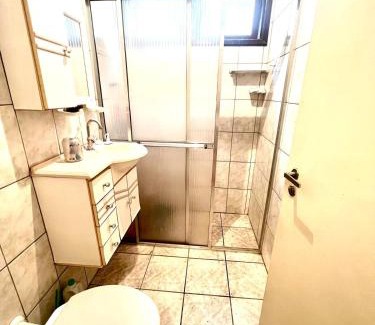 Ocian Apartment | PÉROLA da Praia Grande com cozinha completa