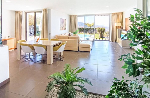 La Quinta House | Palm trees, mountains, sea ? Your view from the balcony and garden of this vacation home in Tenerife