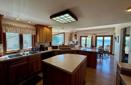 Brutus House | Palmer's Burt Lake Cottage - Private Dock! Waterfront!