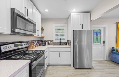 Westgate House | PalmParadise: 5BR Family&Pet Fun, HeatedPool&Games
