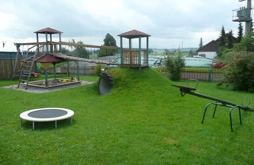 Eschers Apartment | panoramic mountain view, rural area, grand playground, garden house with BBQ