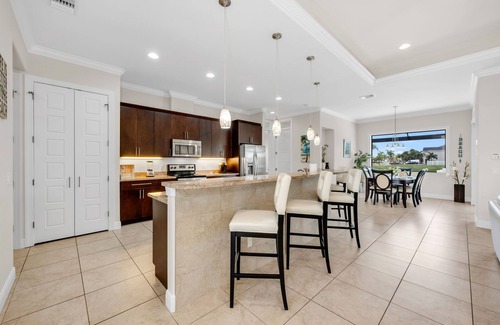 Pelican House | Paradise Villa awaits you on a Gulf access canal and private heated pool and spa