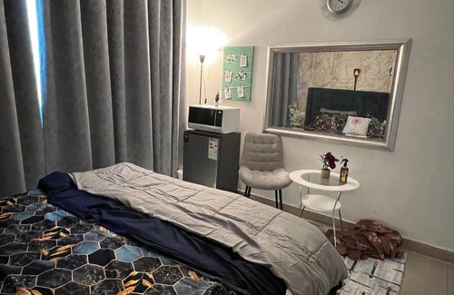Al Majaz House | Park view bedroom in family apartment