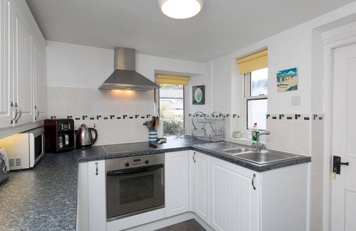 Bangor House | Pass the Keys | Comfortable Stone Built Cottage in Menai Bridge