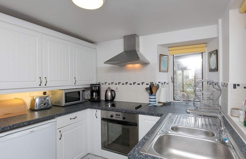 Bangor House | Pass the Keys | Comfortable Stone Built Cottage in Menai Bridge