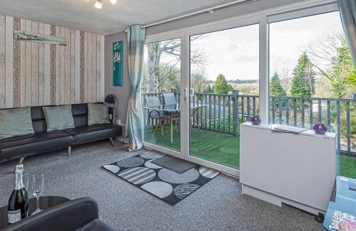 Bont Newydd House | Pass the Keys | Cosy Chalet at Lakeside Glan Gwna Holiday Park