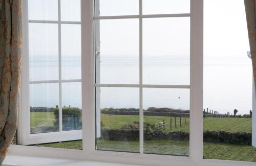 Moelfre House | Pass the Keys Cozy 3 Bedroom Cottage with stunning Sea View