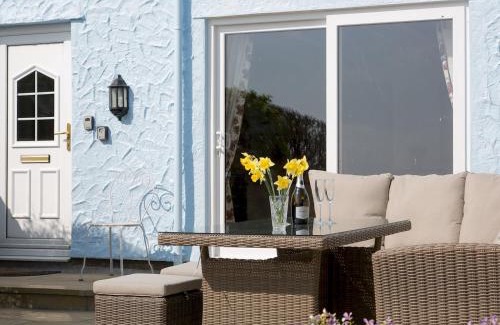 Moelfre House | Pass the Keys Cozy 3 Bedroom Cottage with stunning Sea View