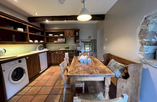 Longnor House | Pass the Keys | Rustic & Spacious Stone Cottage for 6 & Dogs