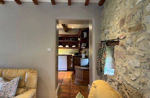 Longnor House | Pass the Keys | Rustic & Spacious Stone Cottage for 6 & Dogs