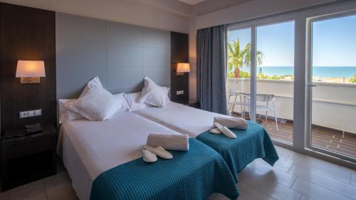 Punta Umbria Hotel | Pato Amarillo