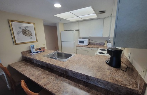Indian Rocks Beach Condo | PENTHOUSE BEACHFRONT CONDO TOP FLOOR BALCONY HEATED POOL HOT TUB, 1450 SQ FT 2/2