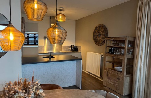 Biddinghuizen Apartment | Penthouse met Jacuzzi en Sauna aan het water