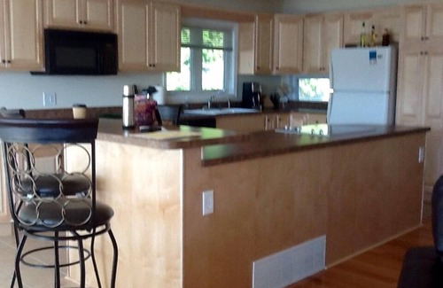 Norton Shores House | Pet Friendly Lakefront Beach Cottage