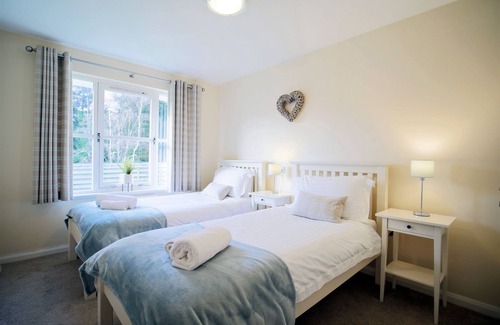 Aviemore Apartment | Pet friendly large four bedroom property with fire, sauna , enclosed garden with BBQ and views of th
